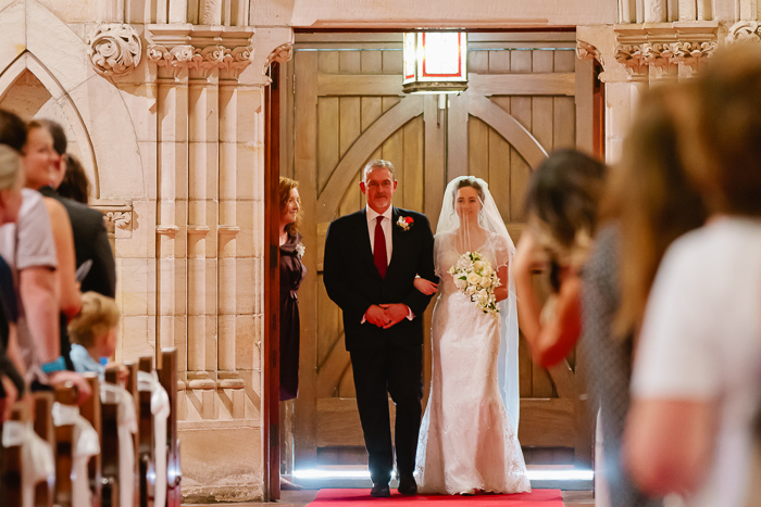 bride-walks-down-the-aisle-with-her-father