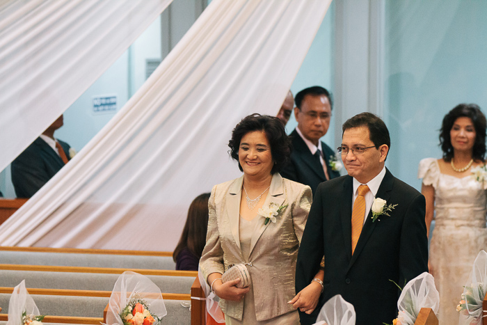 parents-of-the-groom-enter-the-wedding