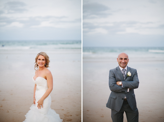 husband-and-wife-standing-on-the-beach