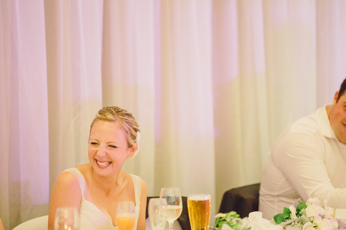 bride-laughs-at-her-own-mention