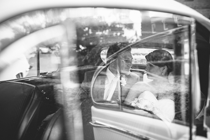 husband-and-wife-in-wedding-car