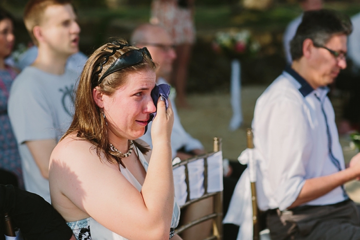 Groom's sister cries during Ceremony at Wedding