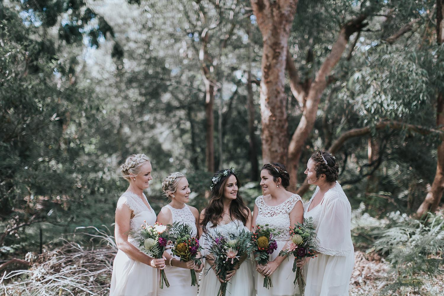 bride with her bridesmaids at the grounds