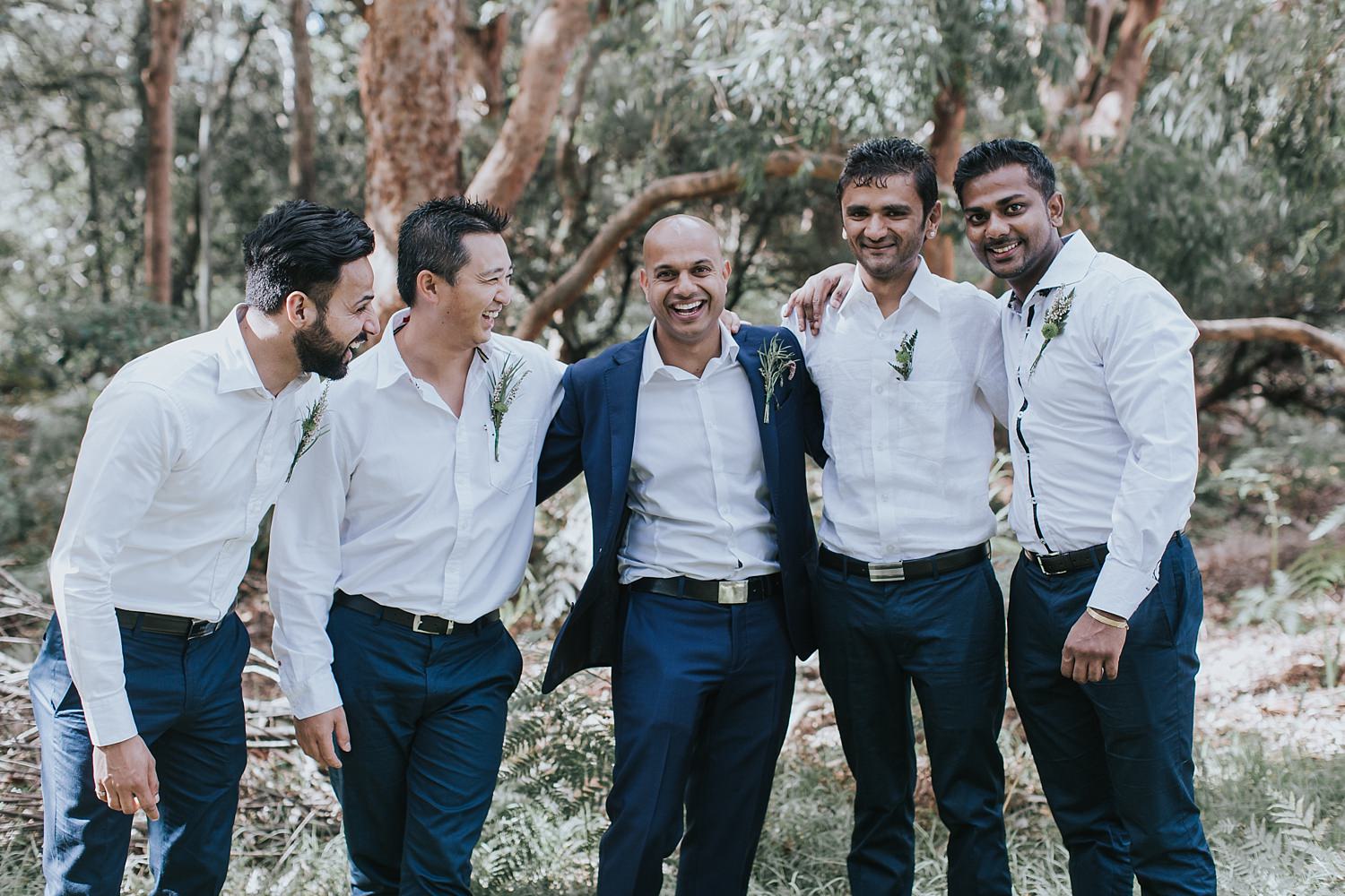 groom with his groomsmen at the grounds of alexandria