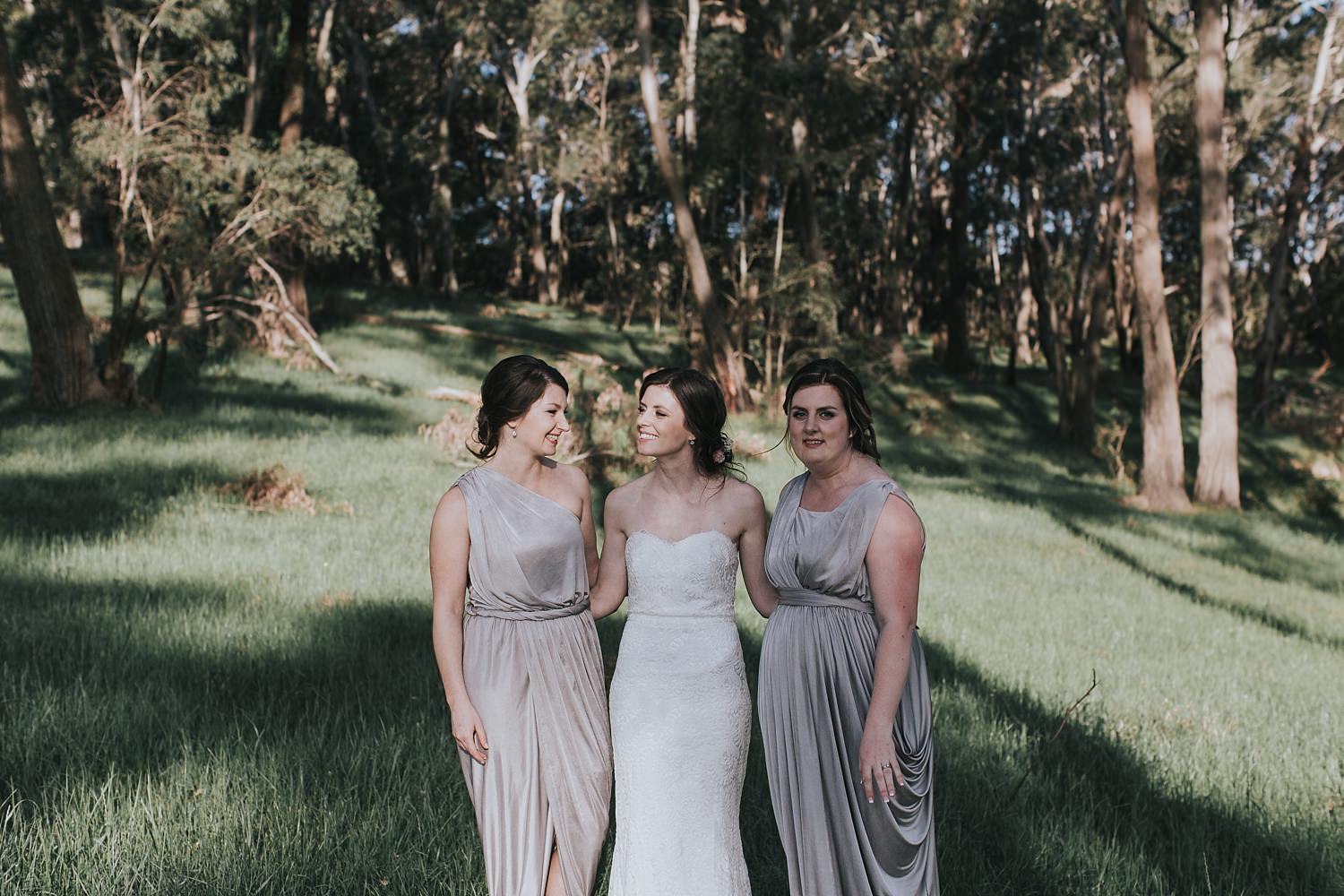 beautiful bridesmaids in centennial vineyards