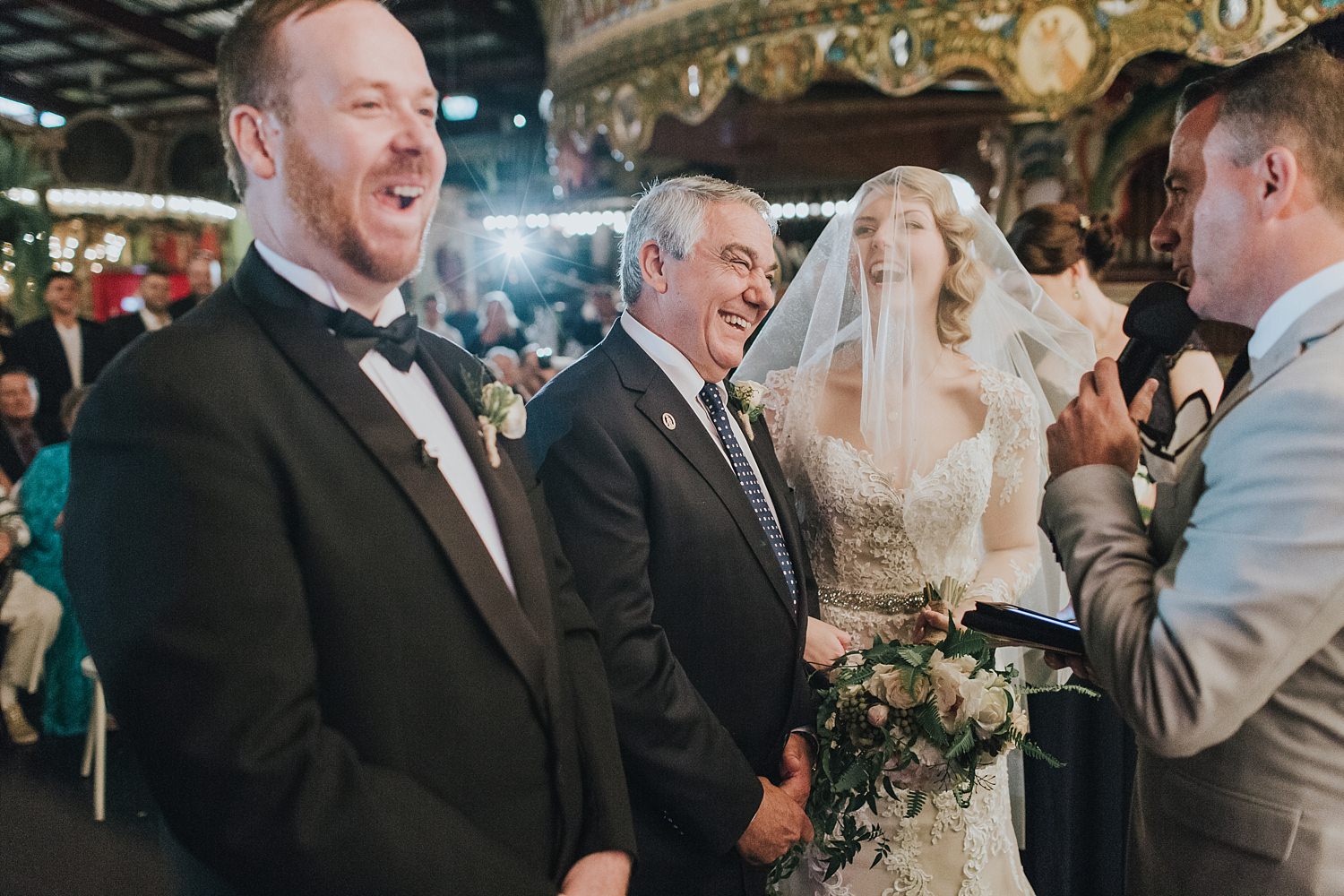excited father of the bride laughing at sydney wedding ceremony