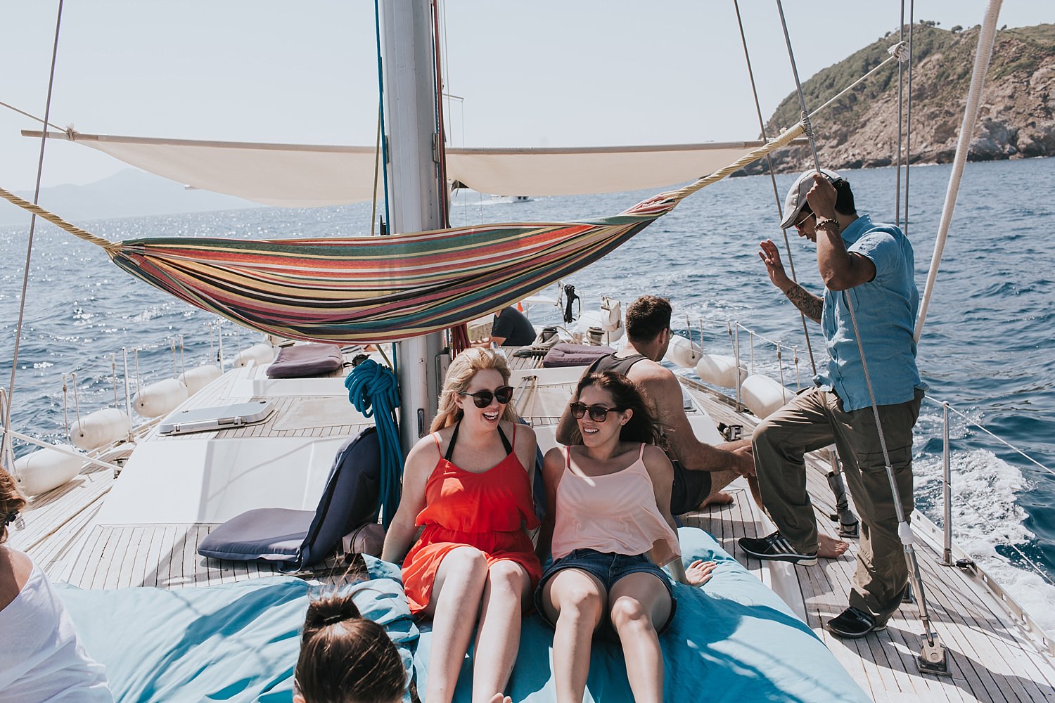 bride relaxes with a sailing tour of skiathos
