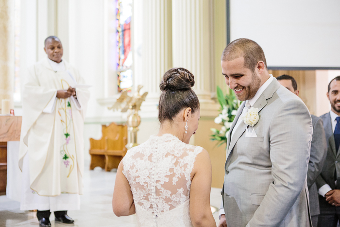 groom-receives-his-bride-at-altar