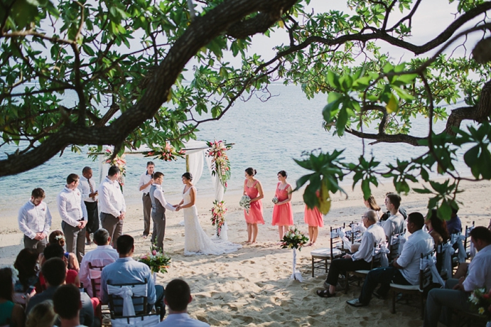 Fiji wedding ceremony on the beach under a large tree