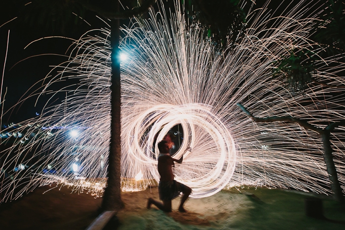 Fire twirling and Sparks during Fijian performance
