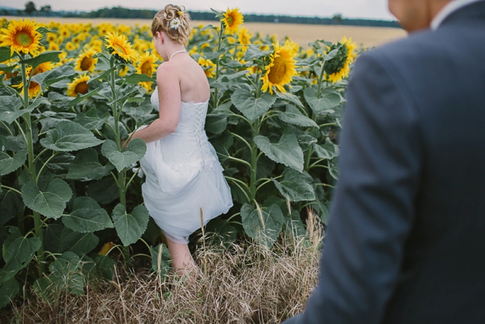 bride-and-groom-in-sunflower-field