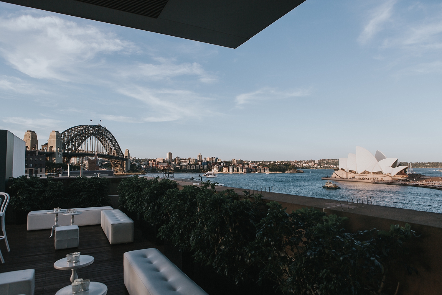view of sydney harbour bridge from the terrace at the mca