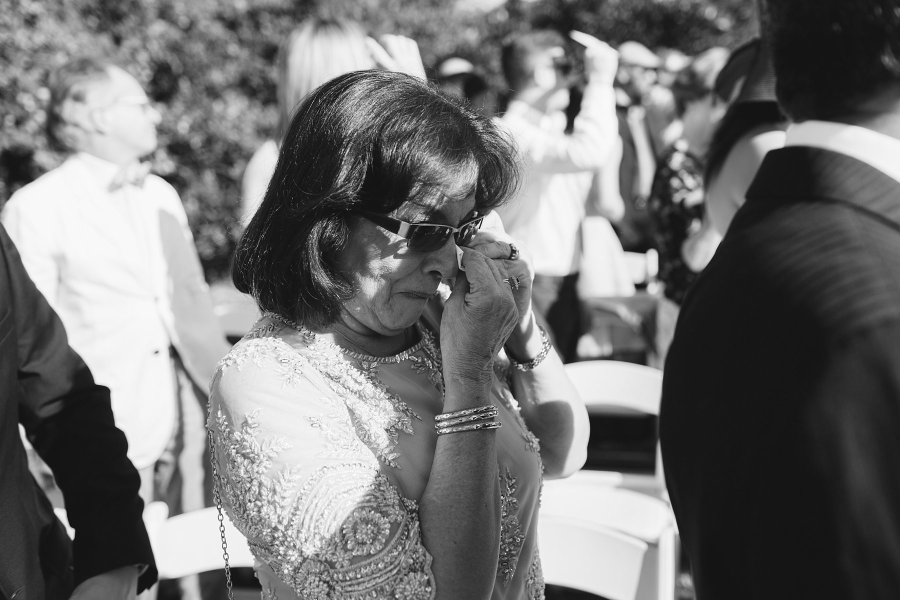 emotional mother of the groom on wedding day