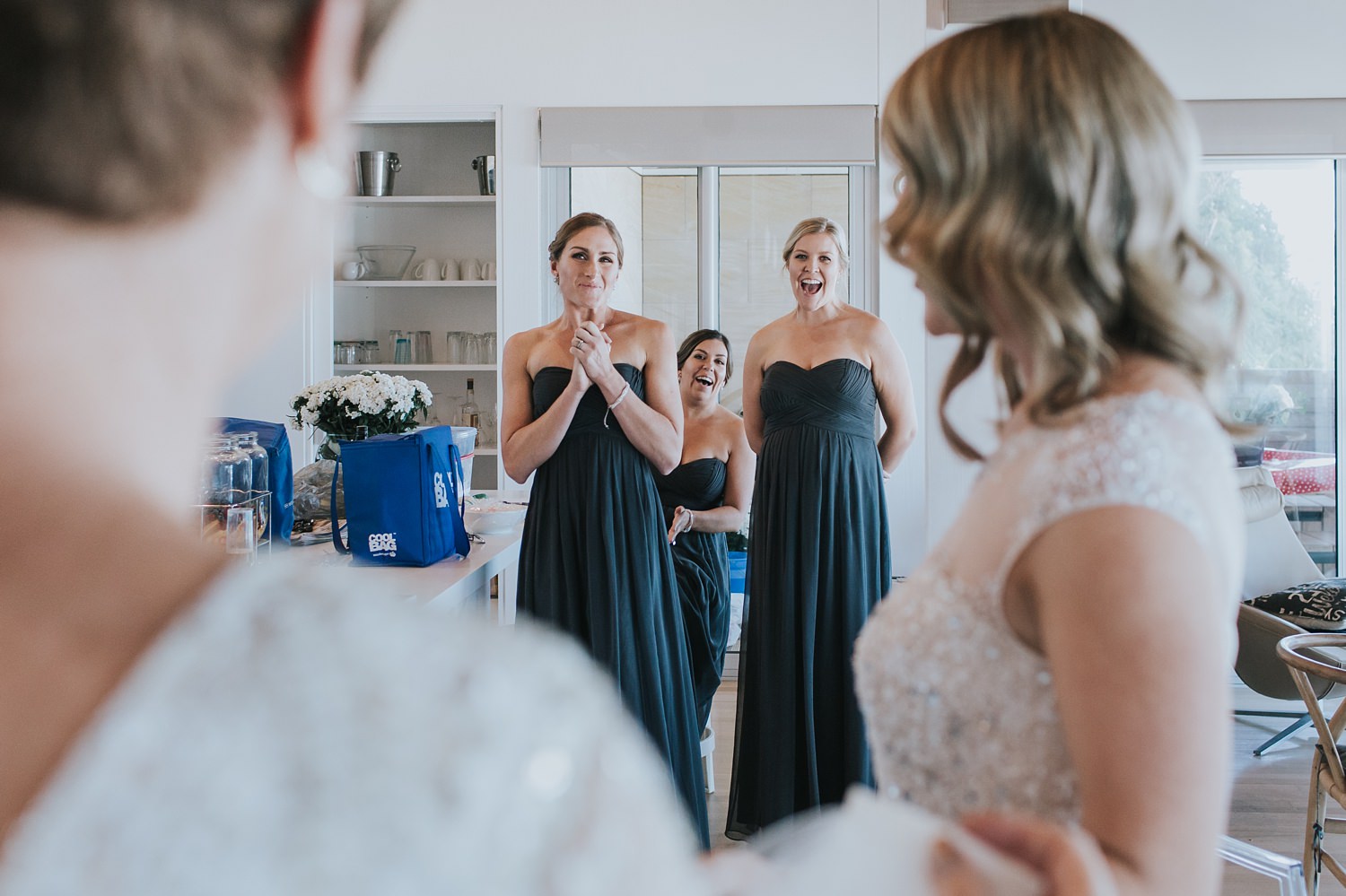 bridesmaids excited to see bride