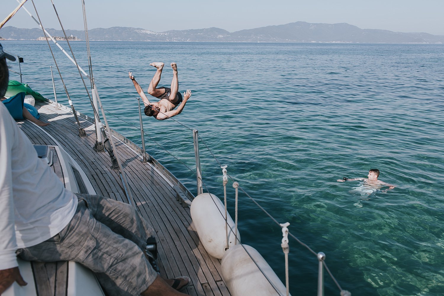 diving into the water on greek islands