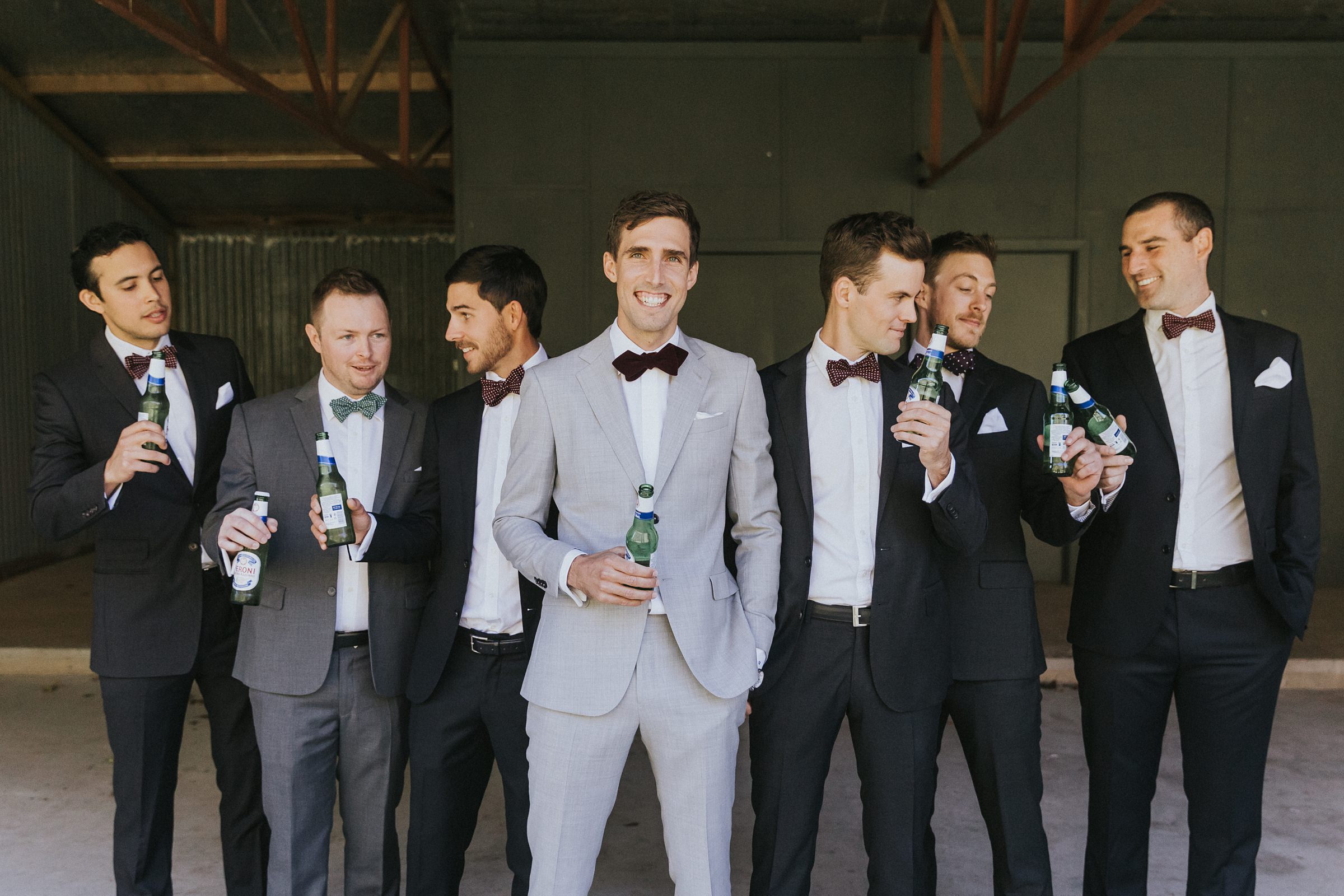 portraits with the groom and groomsmen in berry