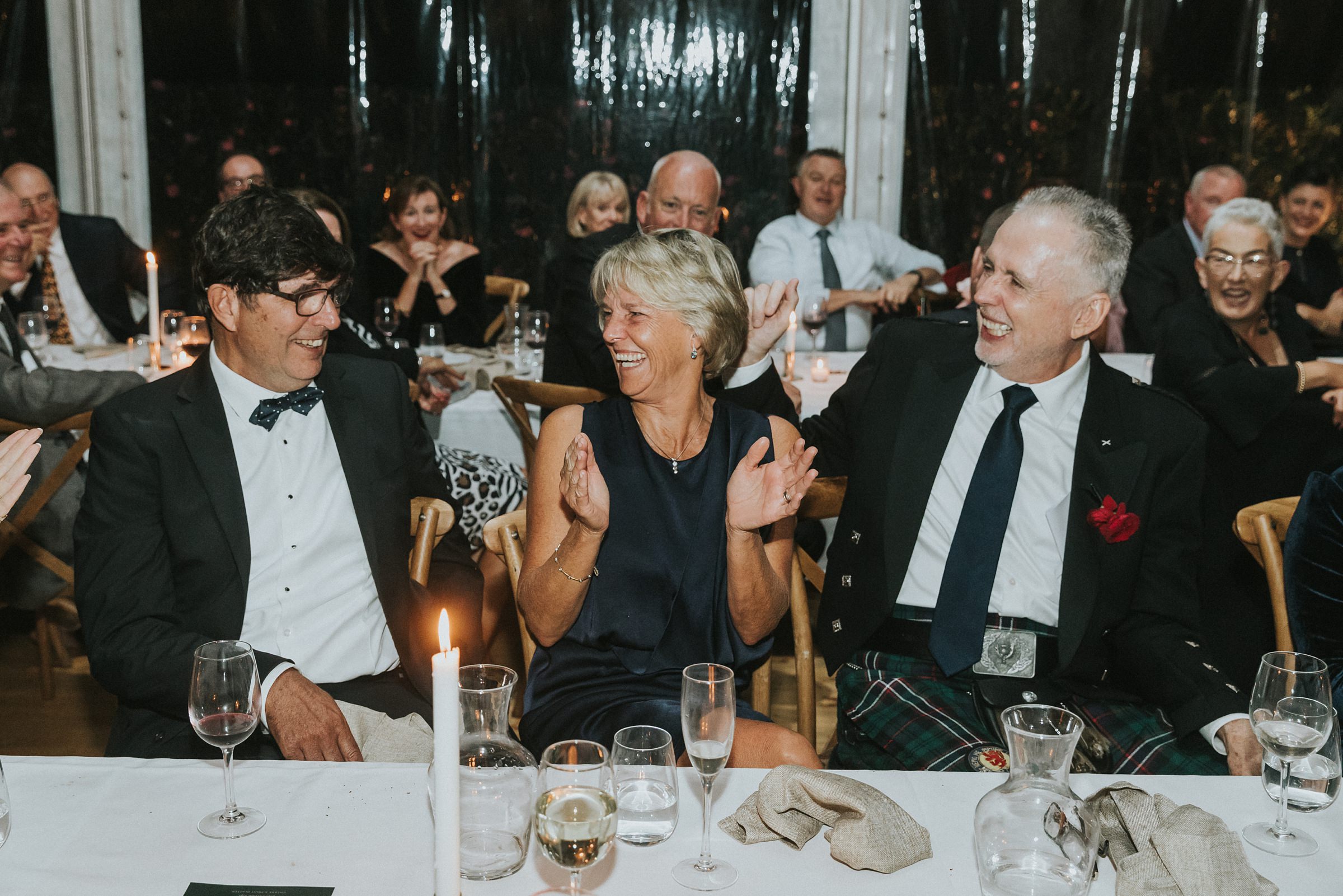 parents of the happy couple erupt in laughter during wedding speeches in berry