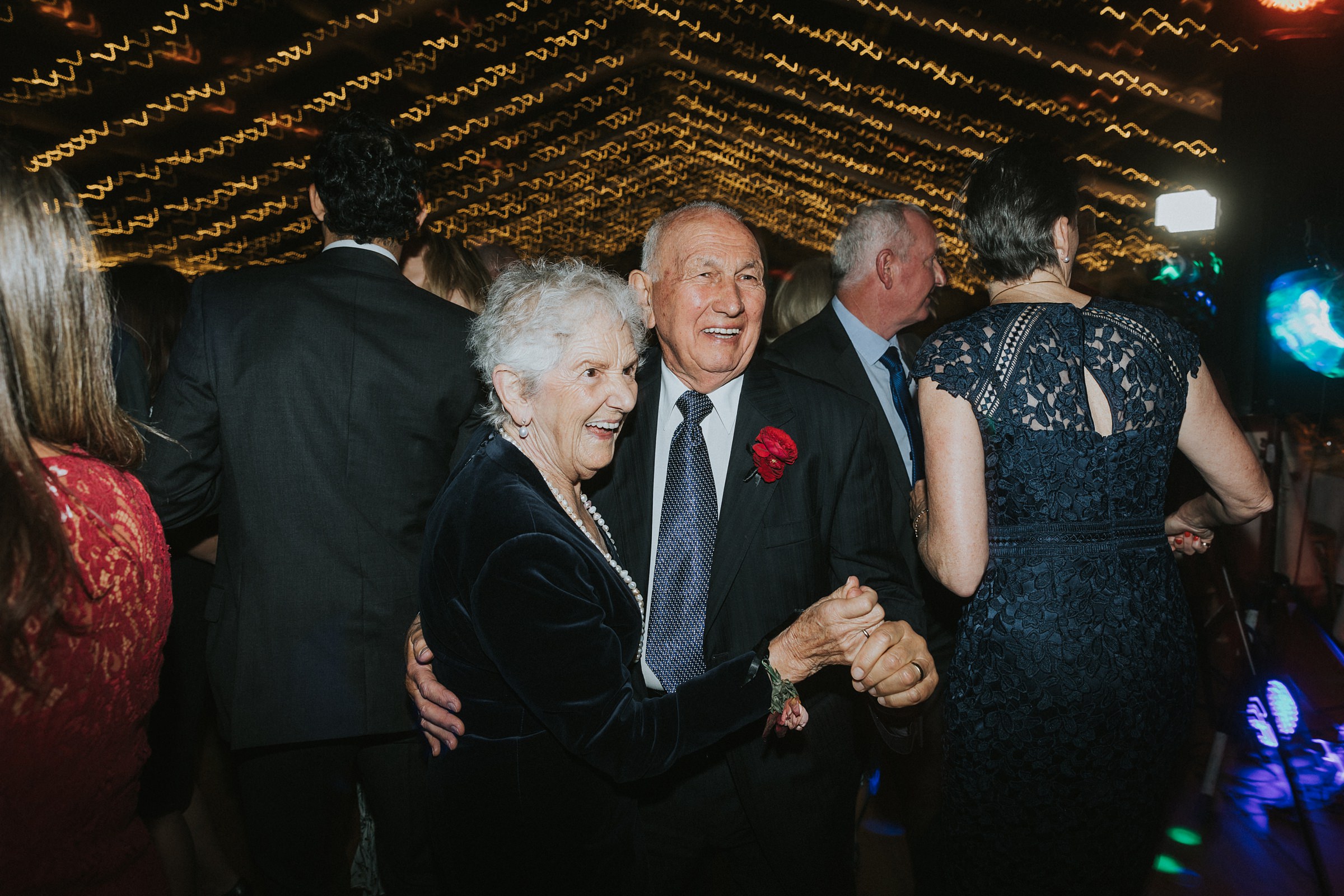 grandparents ripping up the d-floor at wedding reception